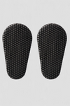 Pair of black armor inserts on a light gray background