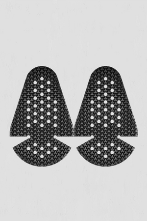 Pair of black chest armor inserts with textured surface on a light gray background